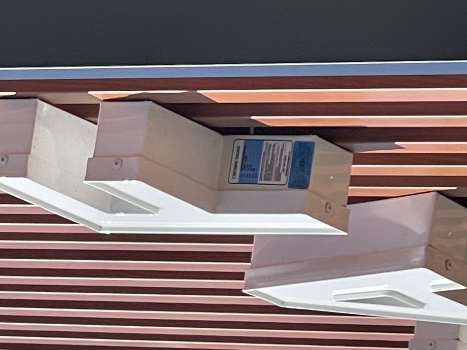 Close-up of channel letter raceway mounting and UL label for service access