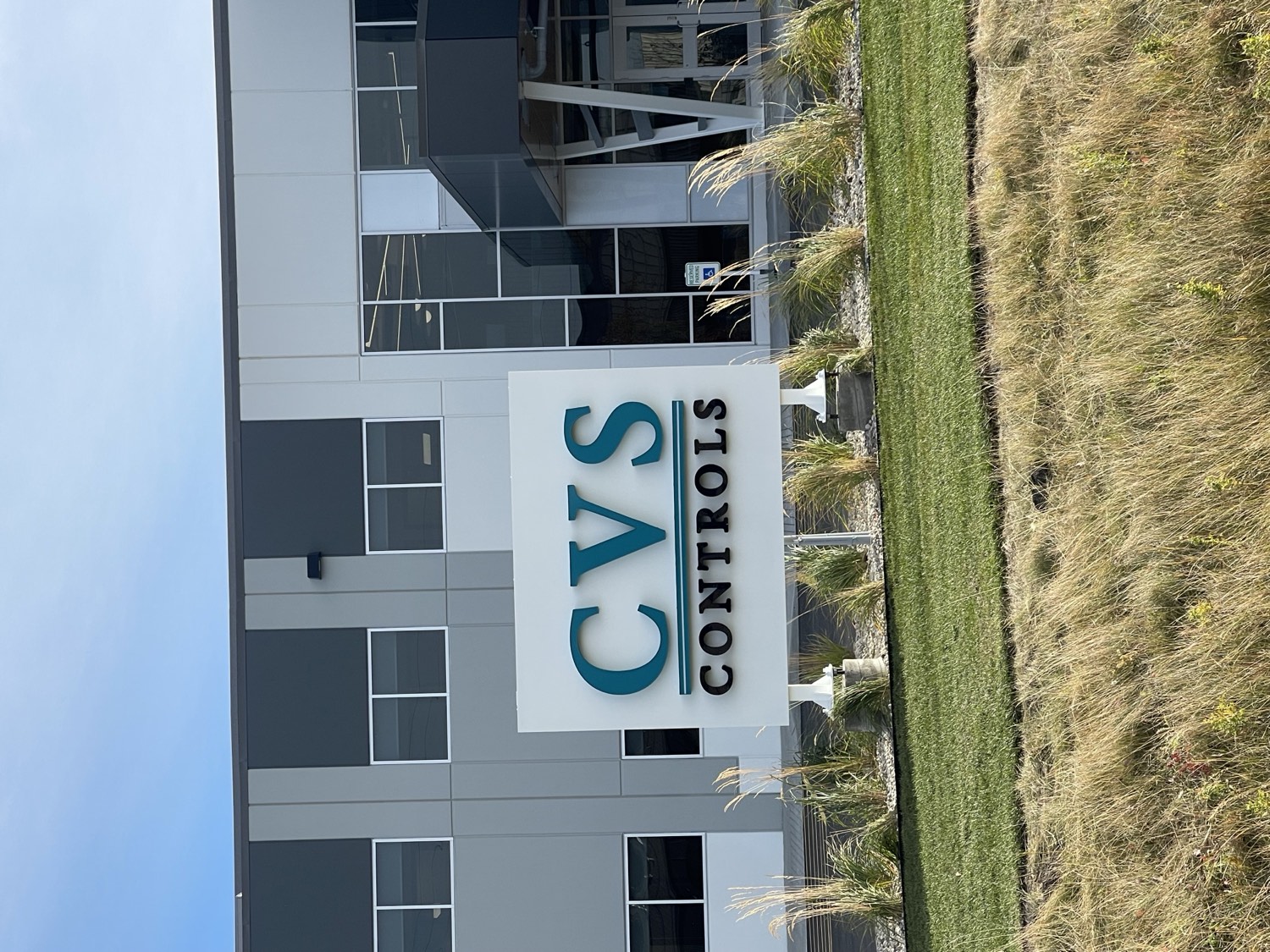CVS Controls freestanding monument sign in front of a commercial building