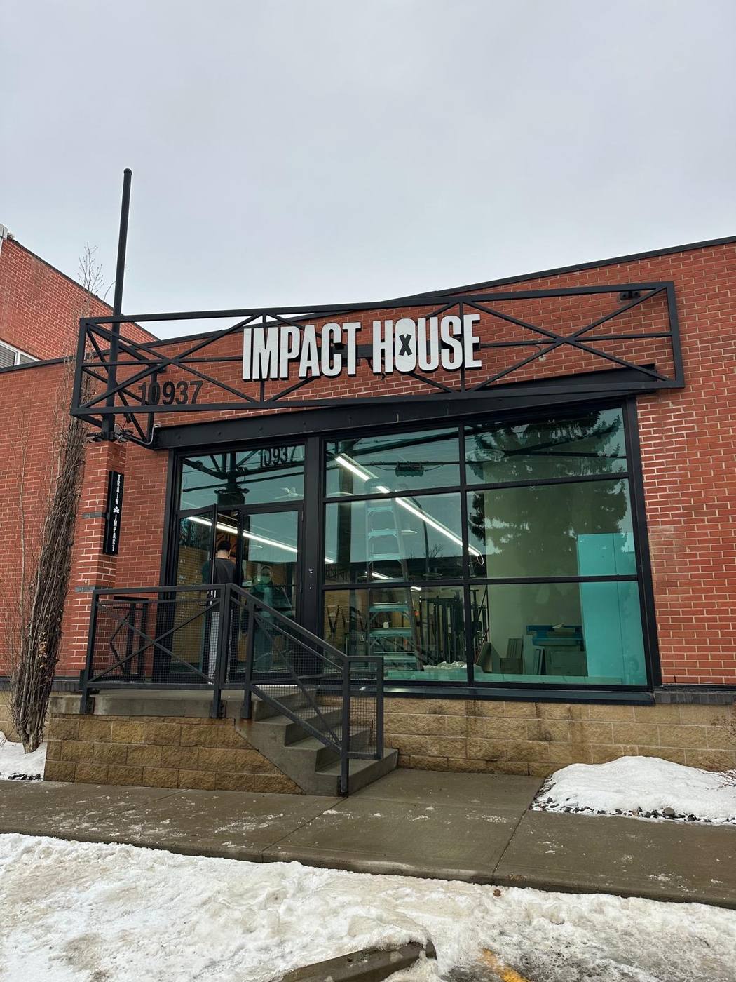 Impact House - Building sign