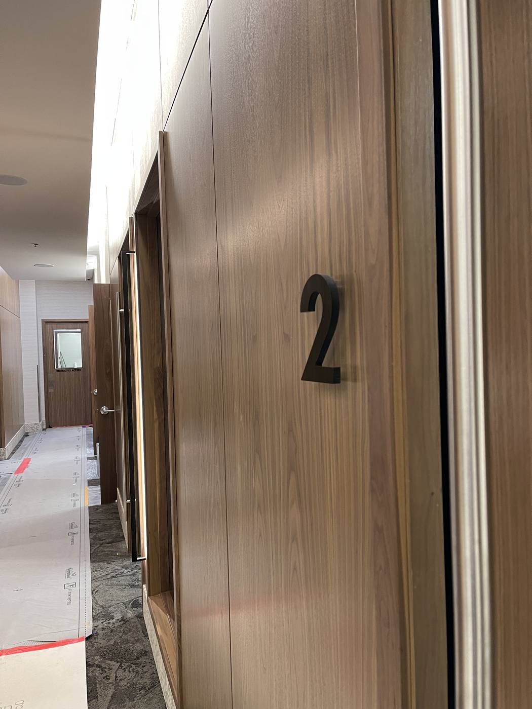 Interior wayfinding numeral - Edmonton sign project