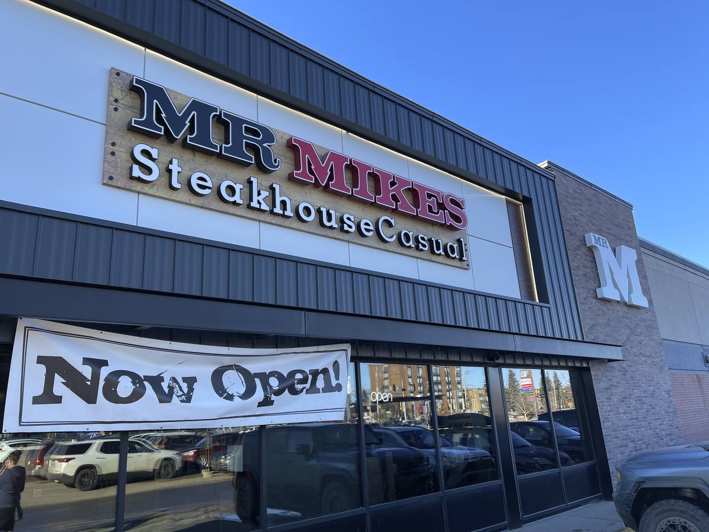 Crown Signs crew installing a commercial sign