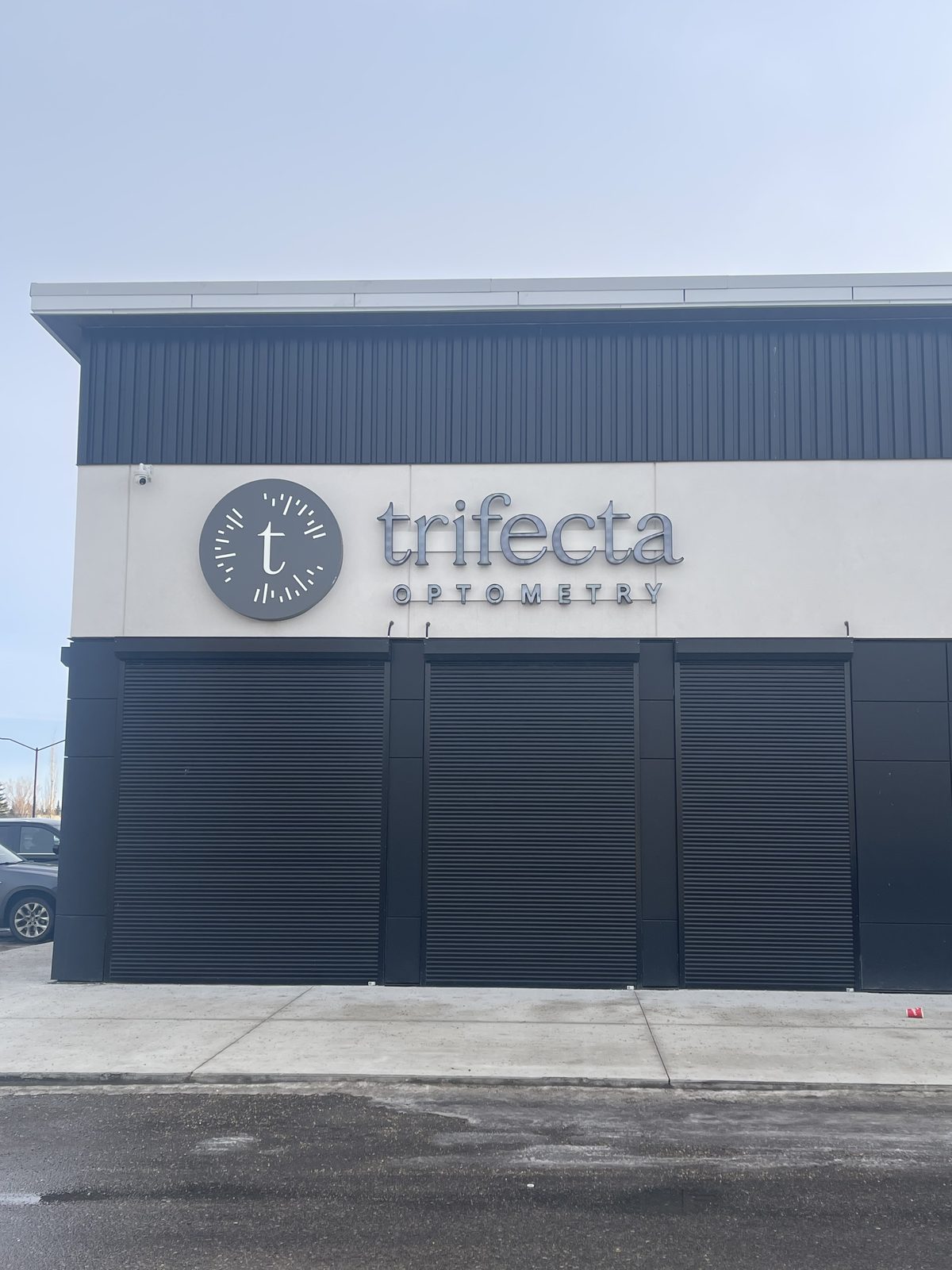 Trifecta Optometry exterior channel letter sign on a commercial building