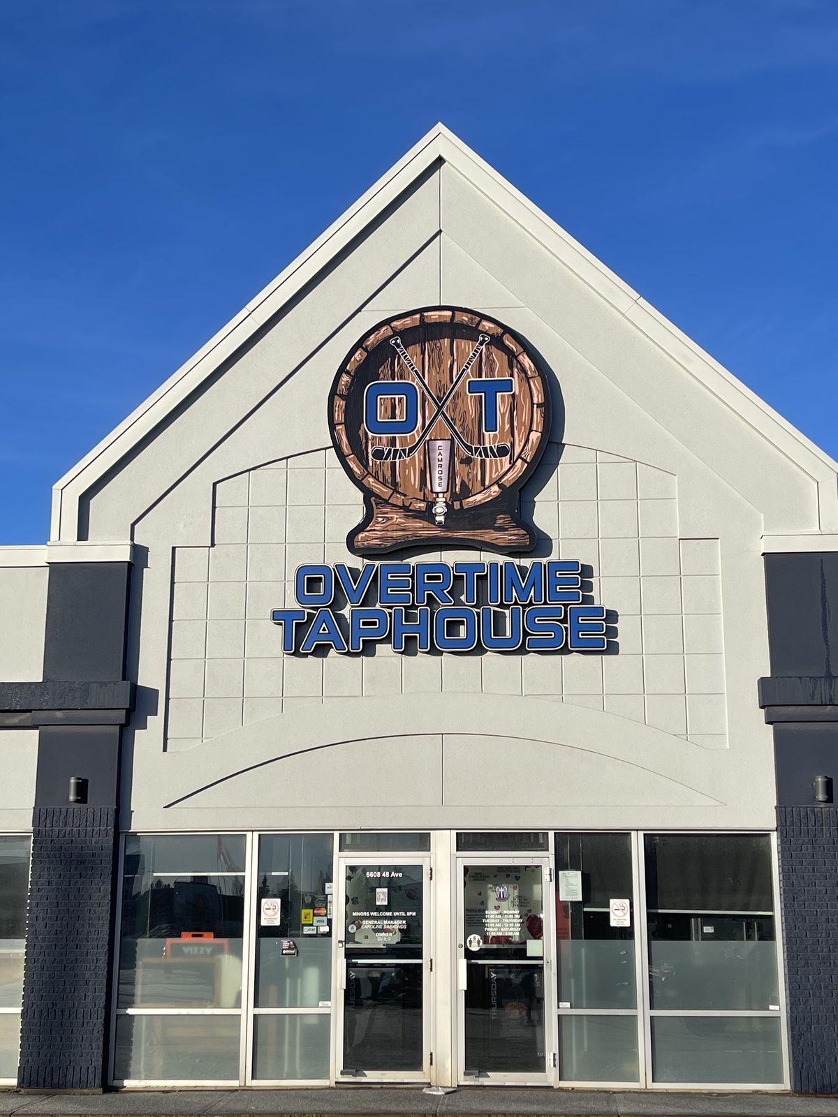 Overtime Taphouse dimensional storefront sign and logo